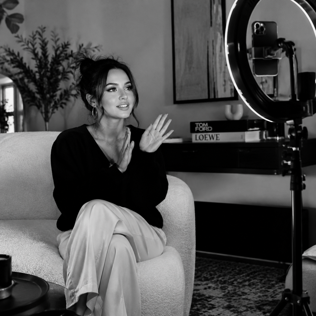 Lifestyle creator filming a video with a ring light